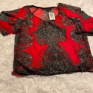 Sheer red & black top.